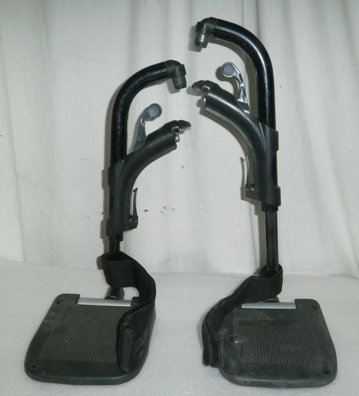 Pair of Invacare Action Leg rest for Wheelchair Has some Rust on Bolt