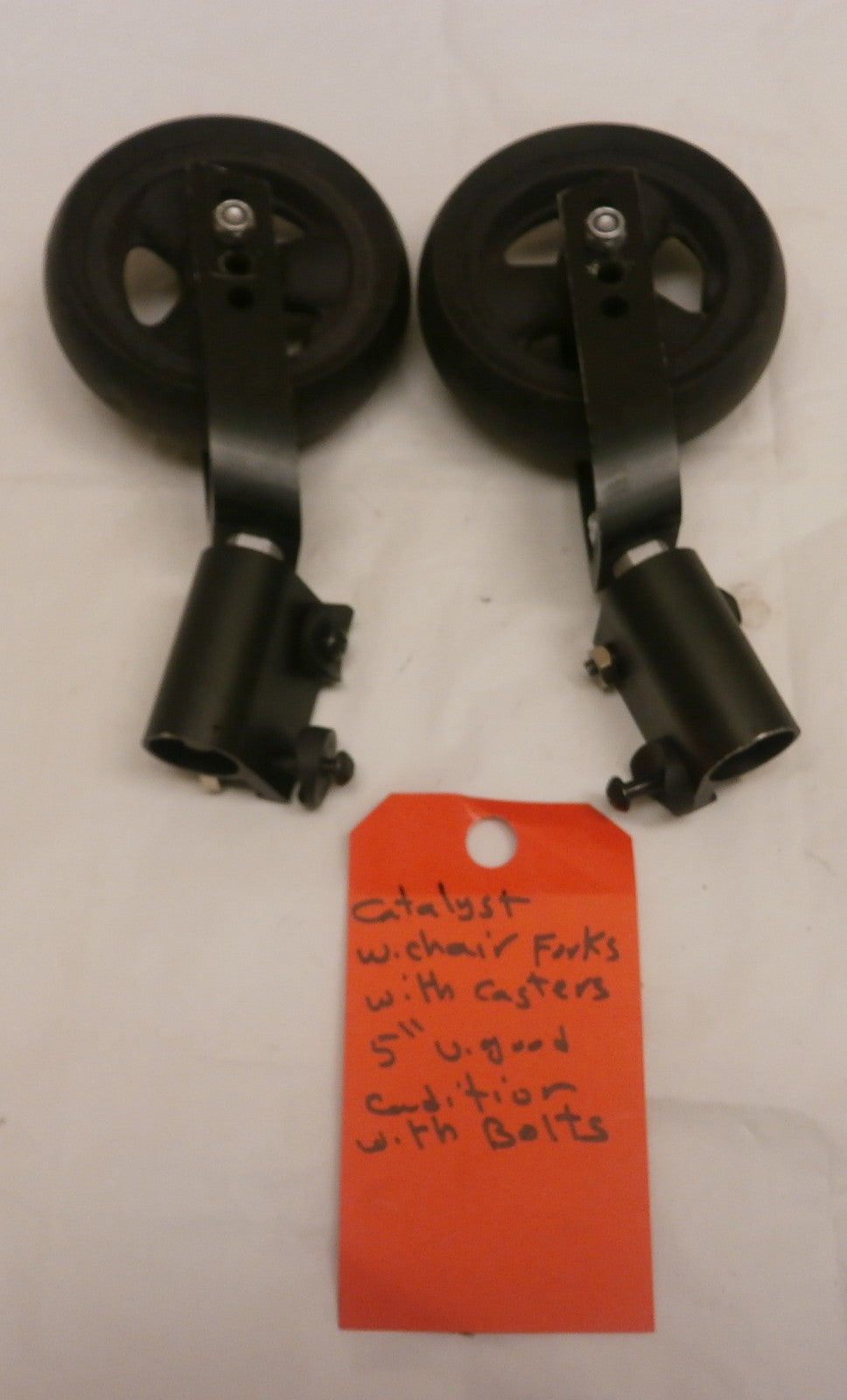 CATALYST WHEELCHAIR FORKS WITH CASTERS 5 INCH VERY GOOD CONDITION WITH BOLTS
