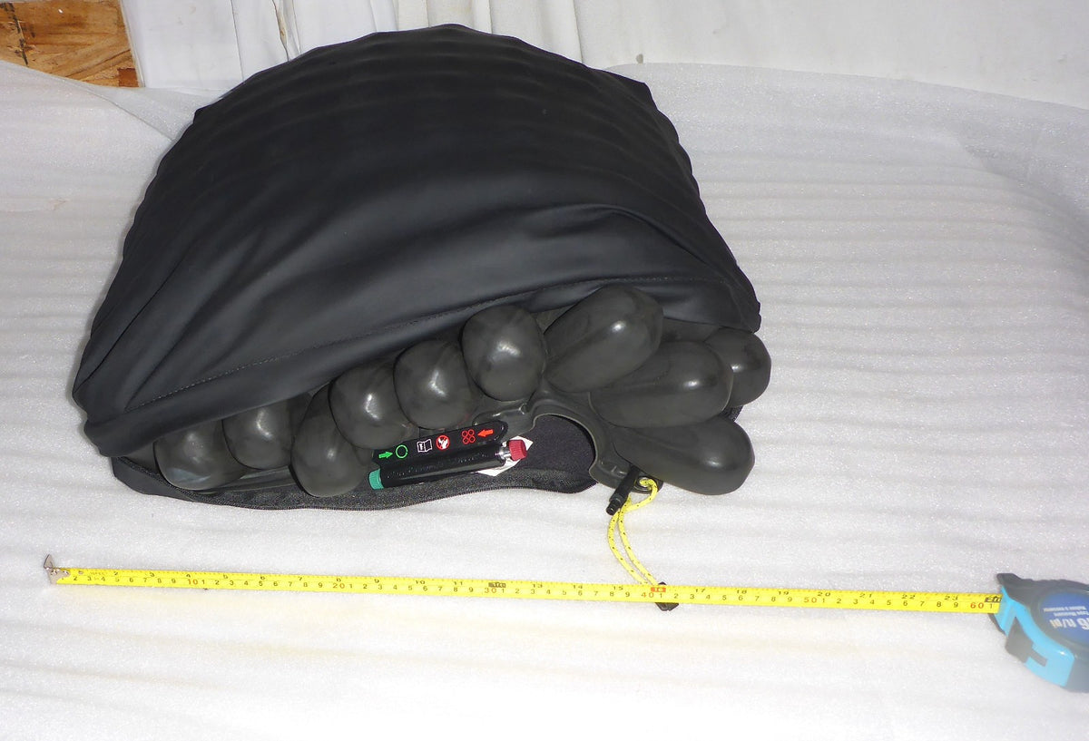 ROHO WHEELCHAIR CUSHION USED 19.5X20.25X4.25 INCH GOOD CONDITION TESTED .