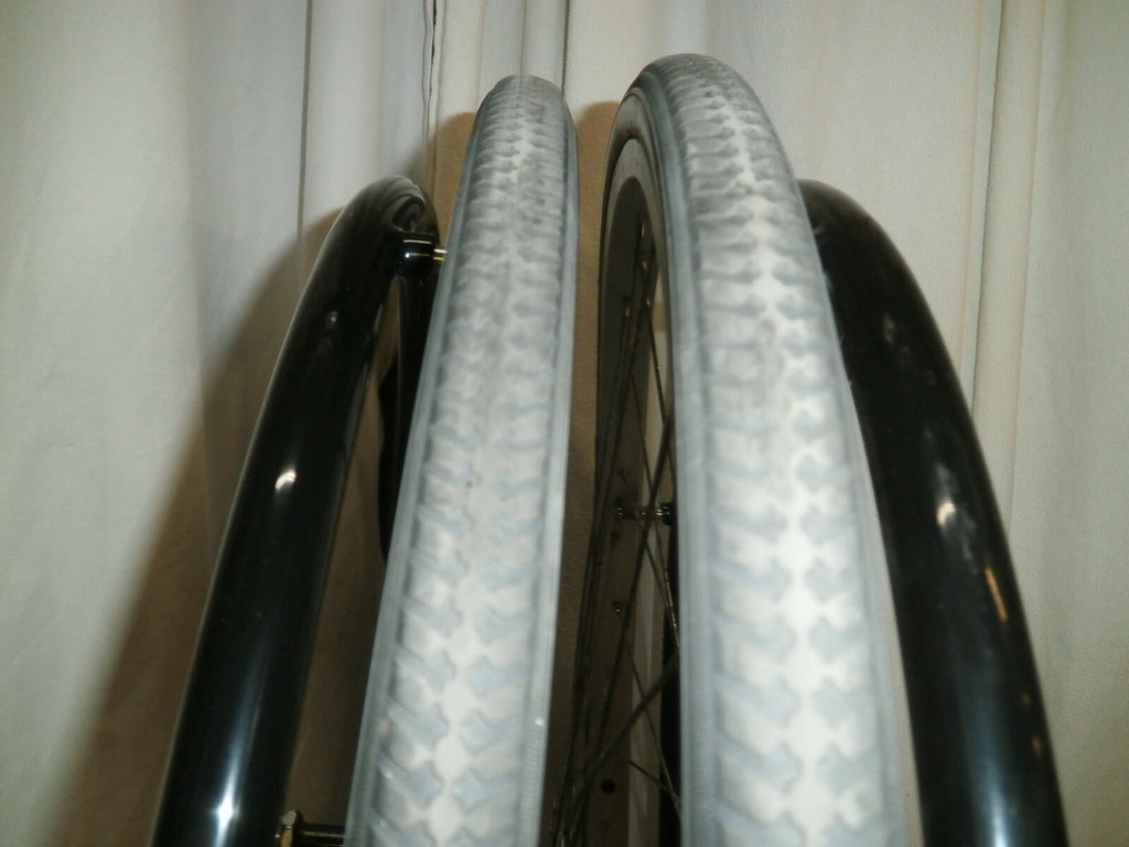 SET OF 2 WHEELS FROM VOYAGE 24" SOLID WITH AXLE VERY GOOD CONDITION