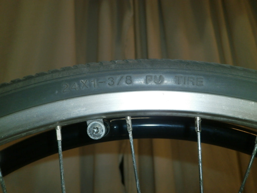 SET OF 2 WHEELS FROM VOYAGE 24" SOLID WITH AXLE VERY GOOD CONDITION