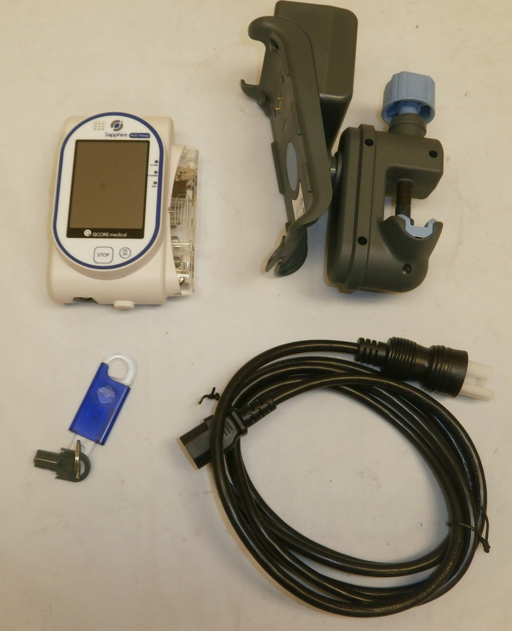QCORE Sapphire multi therapy pump (has bad battery) (has minor screen bubble)