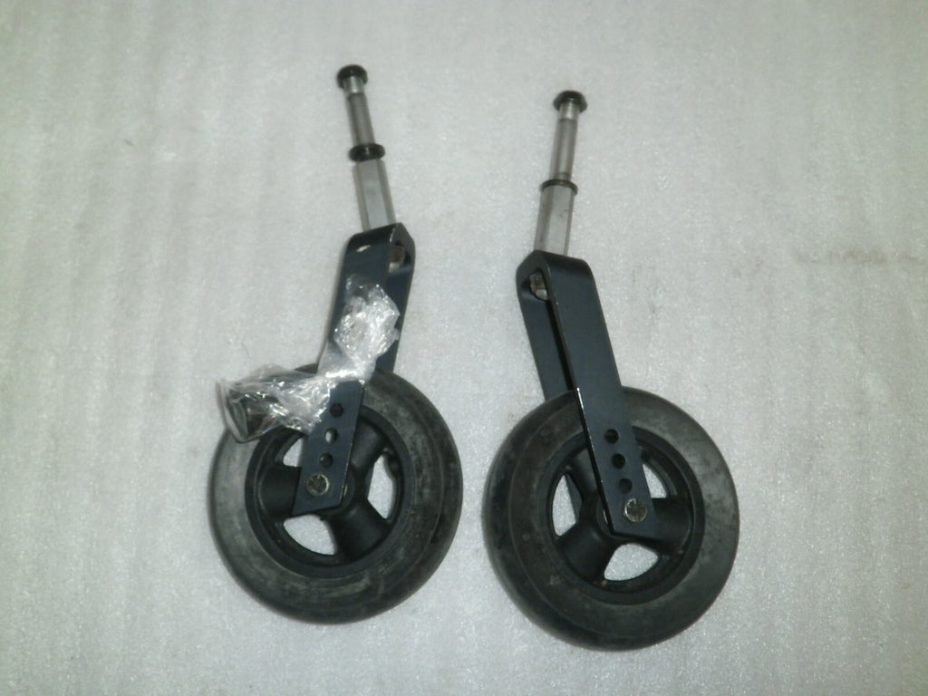 Set of 2 Quickie IRIS Casters with Forks Very Good Condition