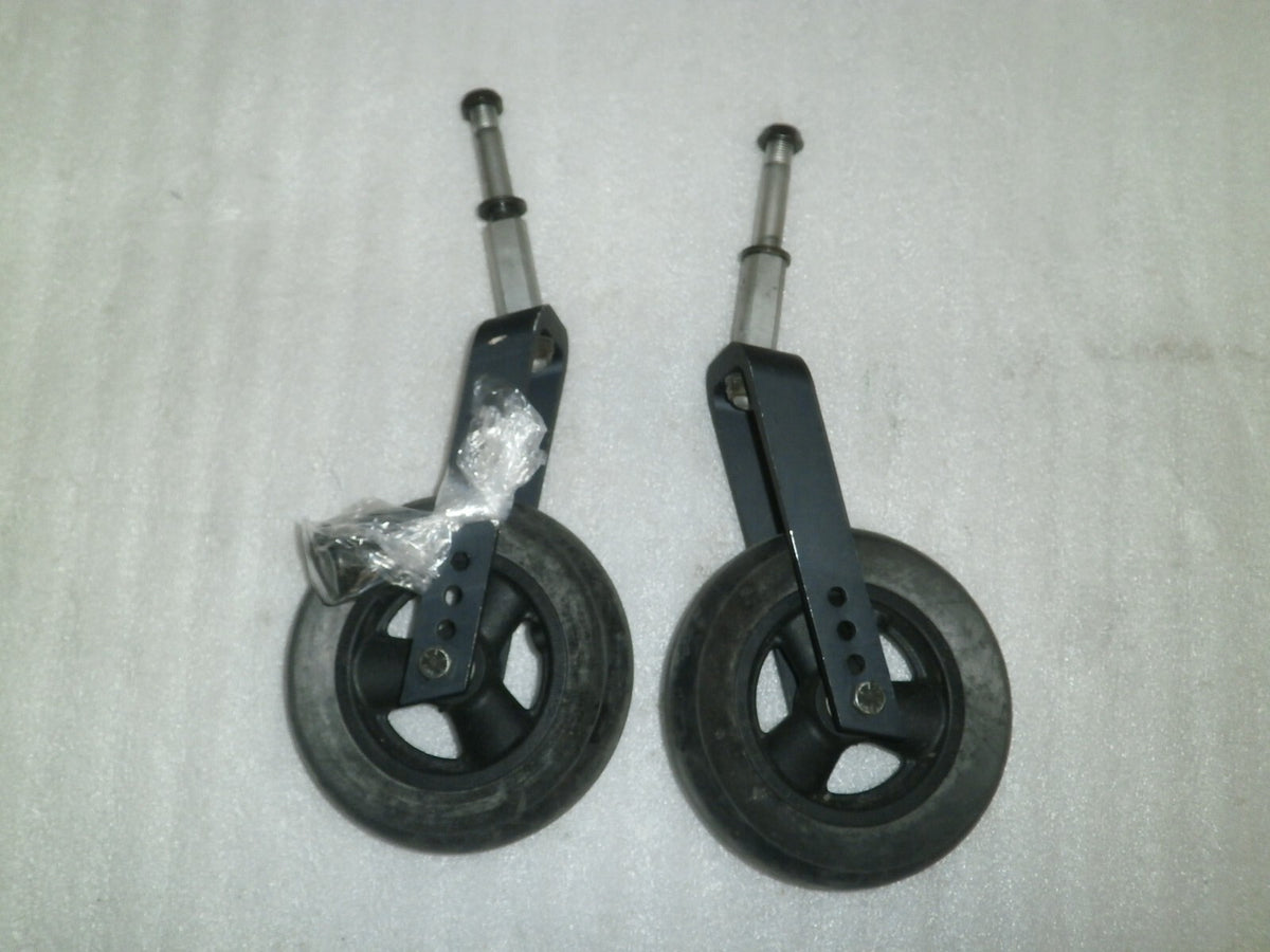 Set of 2 Quickie IRIS Casters with Forks Very Good Condition