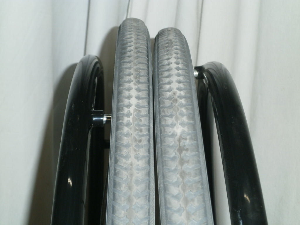 SET OF 2 WHEELS FROM VOYAGE 24" SOLID WITH AXLE VERY GOOD CONDITION