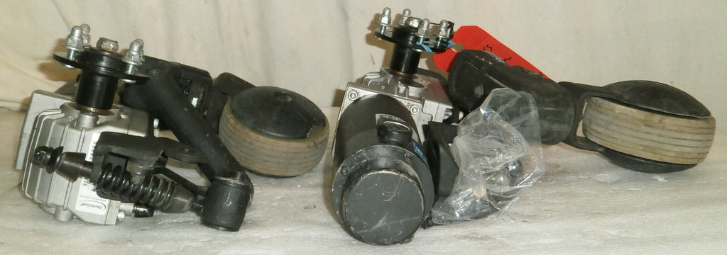 TWO WHEELCHAIR MOTOR QUANTUM DRVASMB1904 AND DRVASMB1903 WITH CASTERS AS PICTURE