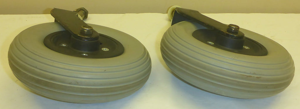 STORM SERIES ARROW POWER WHEELCHAIR FORKS AND 7 INCH CASTERS SOLID GOOD
