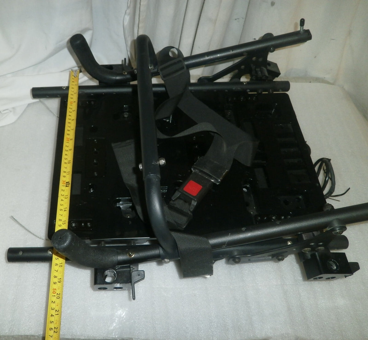 QUICKIE QM-710 Tilt Base with Actuators & Back frame Folded w/ Armrest Support