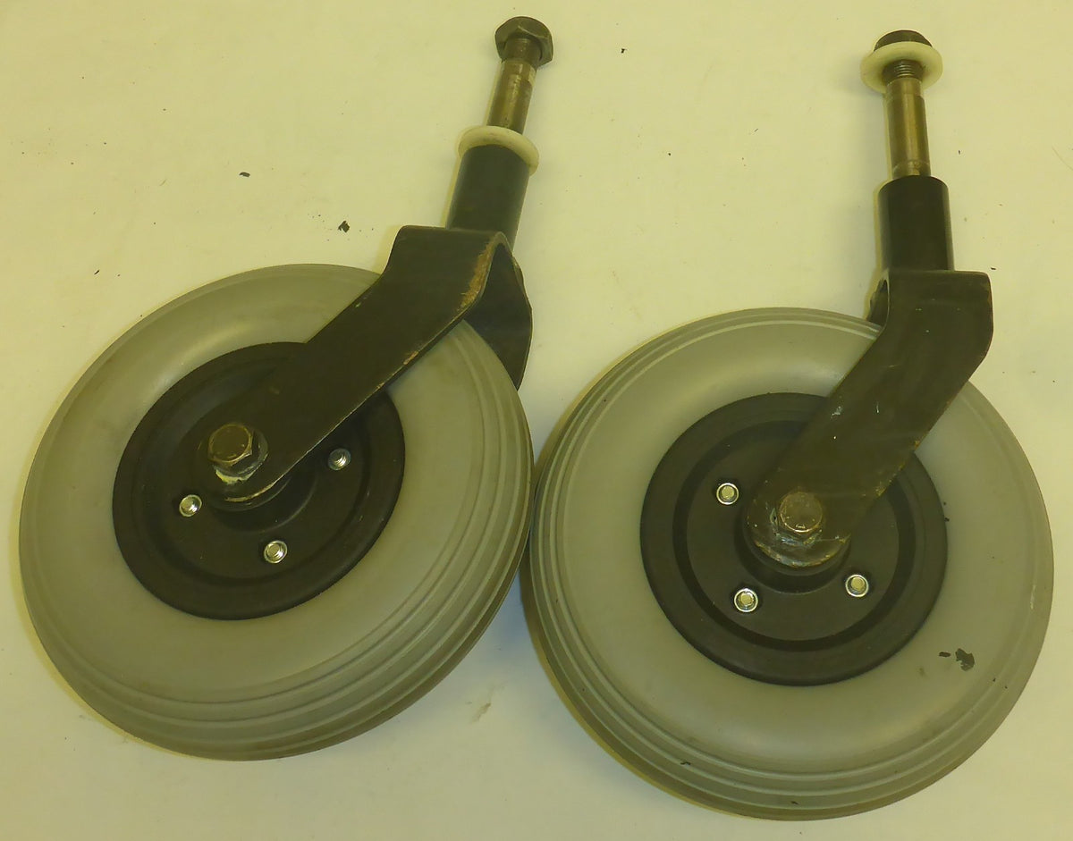 STORM SERIES ARROW POWER WHEELCHAIR FORKS AND 7 INCH CASTERS SOLID GOOD
