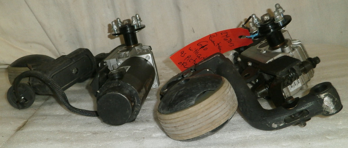 TWO WHEELCHAIR MOTOR QUANTUM DRVASMB1904 AND DRVASMB1903 WITH CASTERS AS PICTURE