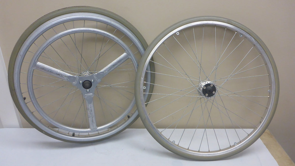 LOT OF TWO-ONE HAND DRIVE WHEELS 24 INCH FOR MYON WHEELCHAIR USED GOOD CONDITION